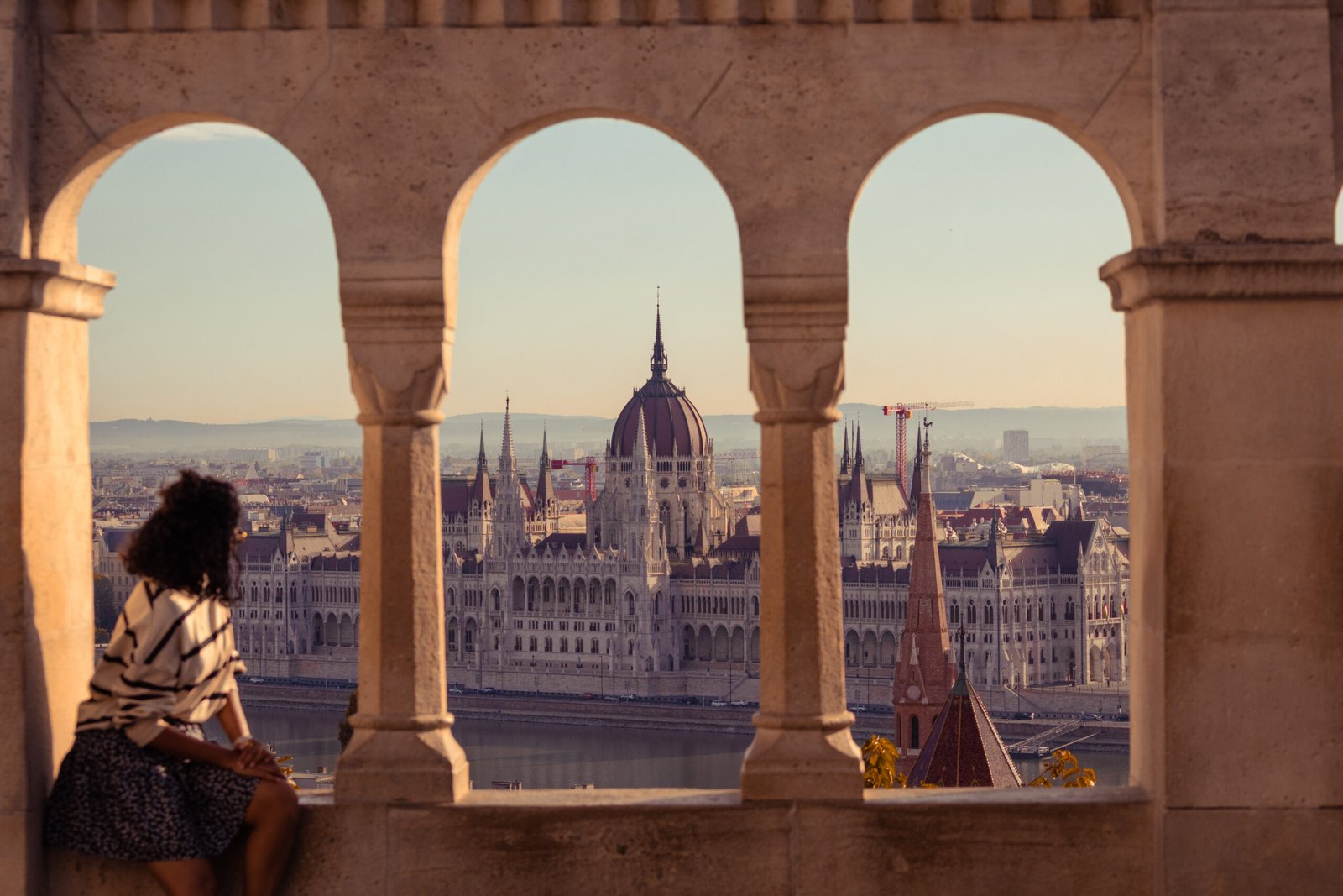 Budapest Parliament building on the Danube River at sunrise
